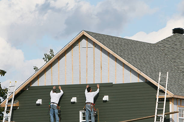 Professional Siding technician working in Spring Mills, PA